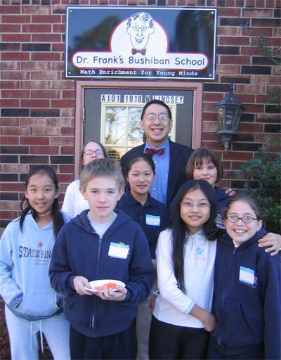 Dr. Wang with students in front of the Bushiban